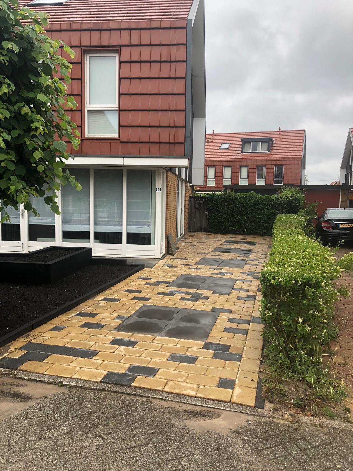 Oprit reinigen reparatie bestrating oprit zoetermeer